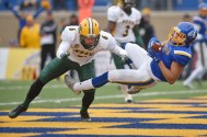 South Dakota State University's Jacob Brown catches the ball scoring a touchdown against North Dakota State University's James Hendricks during the game Saturday, Nov.4, at Dana Dykhouse Stadium in Brookings.